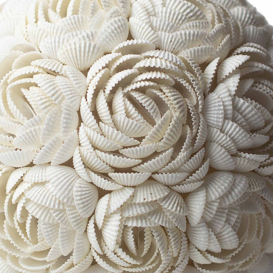 White seashell lamp in oval shape with rose petal design – 20cm, handcrafted in Indonesia, includes LED bulb for soft ambient lighting.


