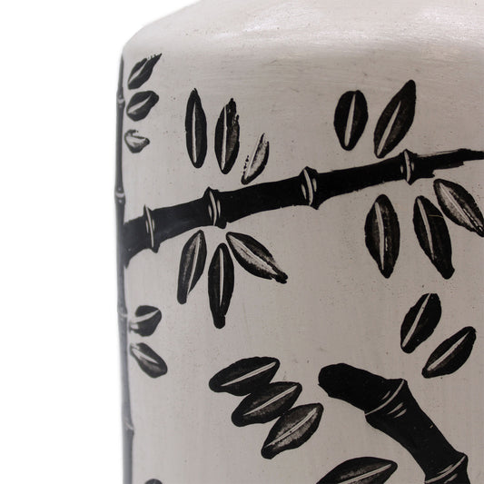 Terracotta vase with black bamboo motif on natural white background – handcrafted in Lombok, ideal for dried flowers or decorative use.

