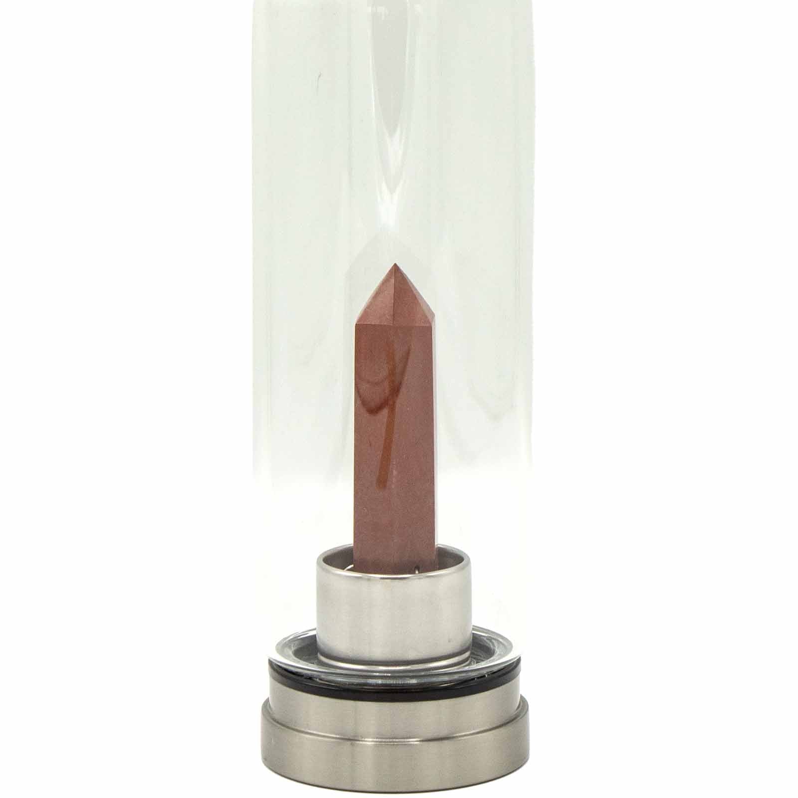 Crystal infused glass bottle with red jasper obelisk, stainless steel lid and base, neoprene sleeve, and gift box. 500ml BPA-free for grounding and vitality.

