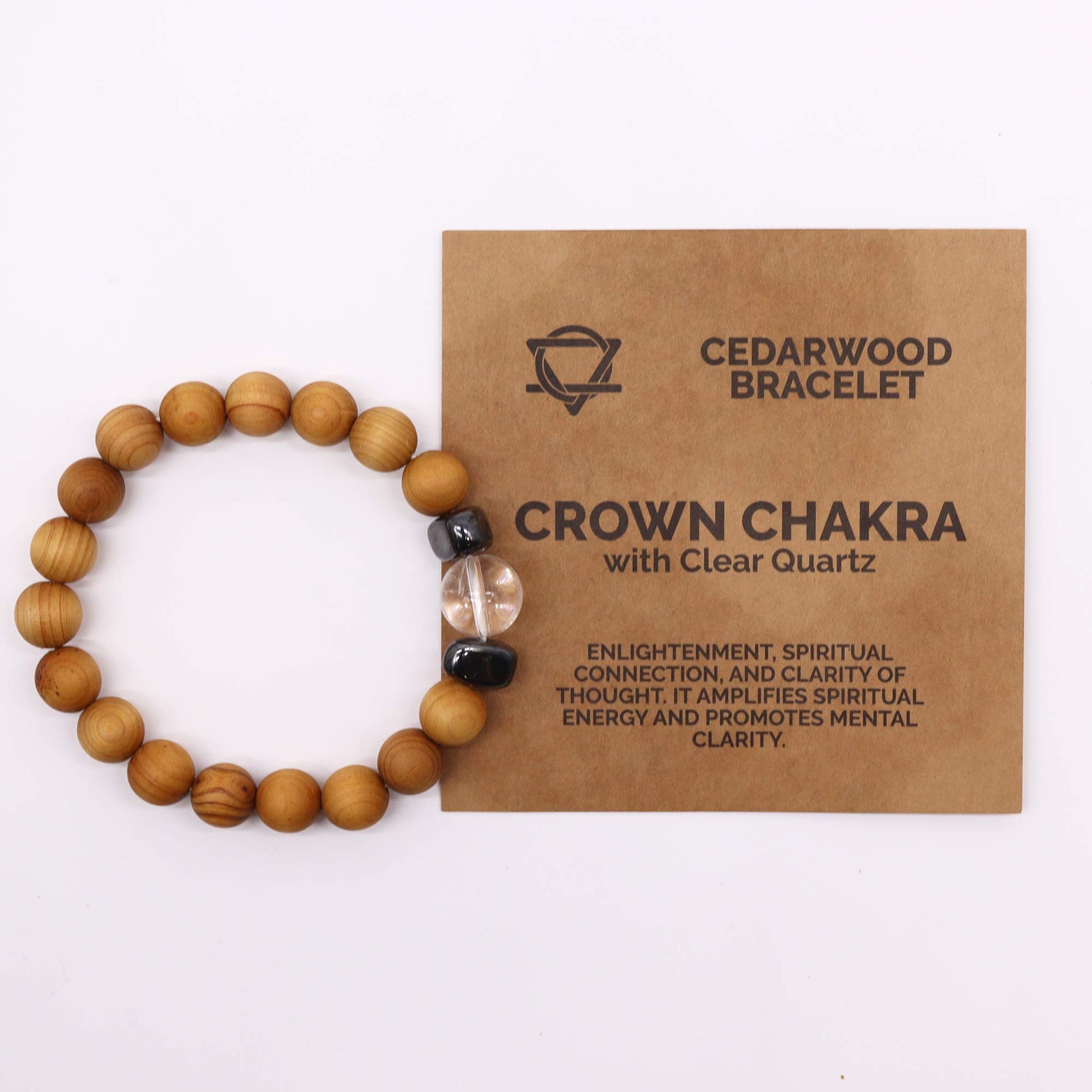 Cedarwood Chakra Bracelet with Clear Quartz for Crown Chakra, enhancing spiritual clarity and connection with soothing cedarwood aroma.

