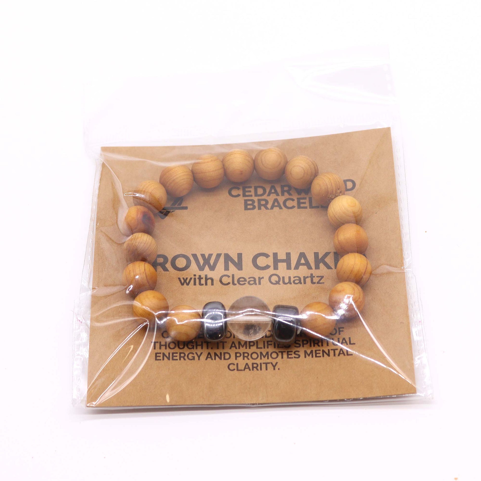 Cedarwood Chakra Bracelet with Clear Quartz for Crown Chakra, enhancing spiritual clarity and connection with soothing cedarwood aroma.

