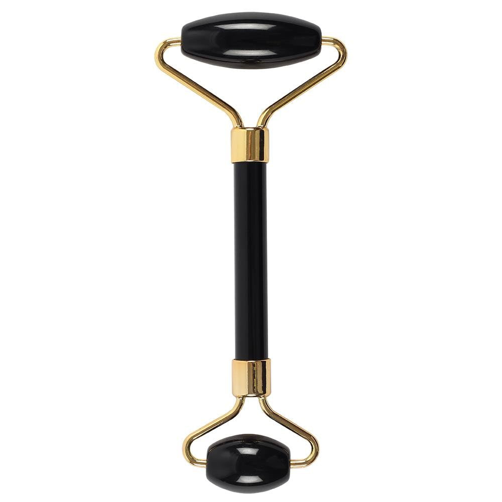 Black Obsidian crystal face roller for detox, grounding, and rejuvenating skincare massage.


