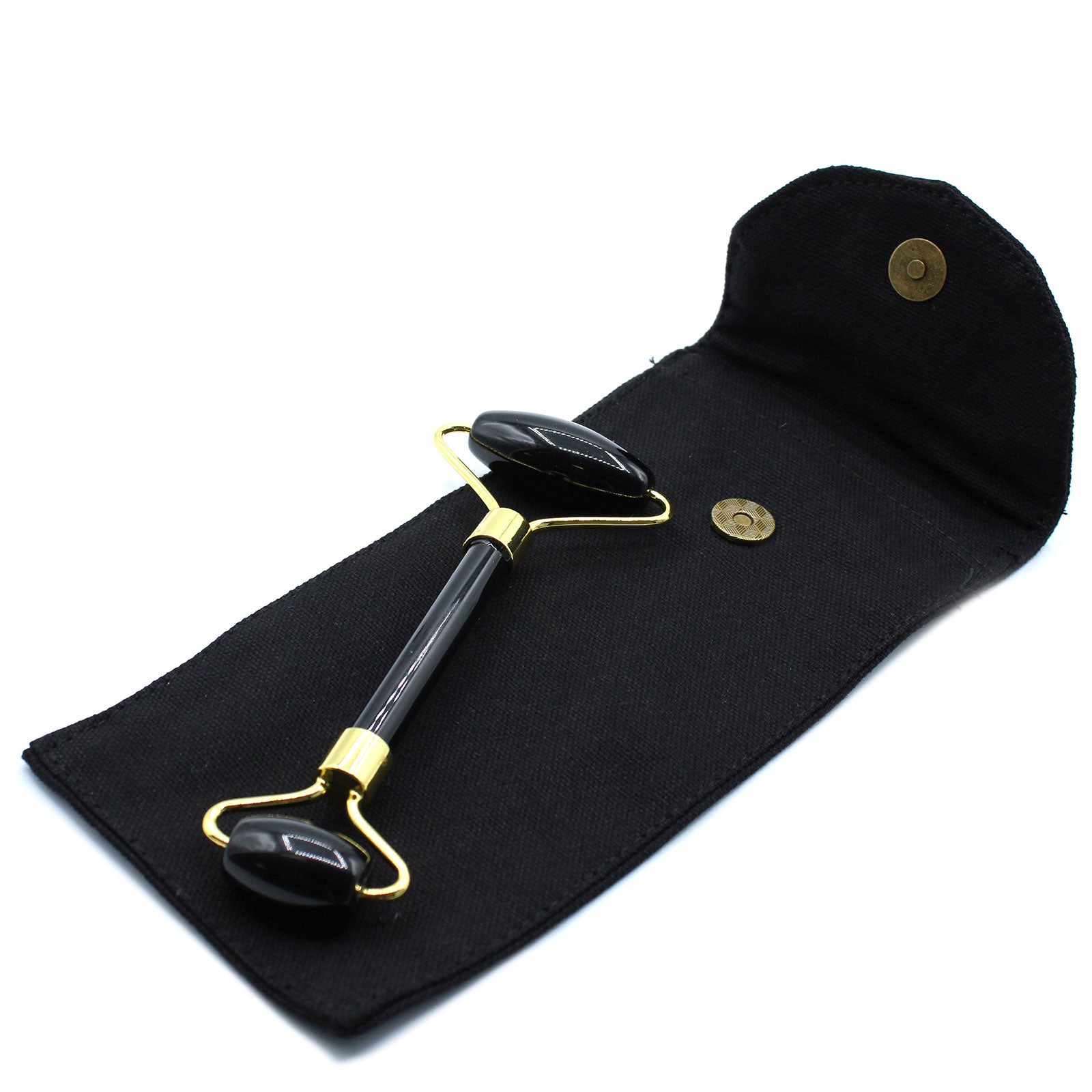 Black Obsidian crystal face roller for detox, grounding, and rejuvenating skincare massage.


