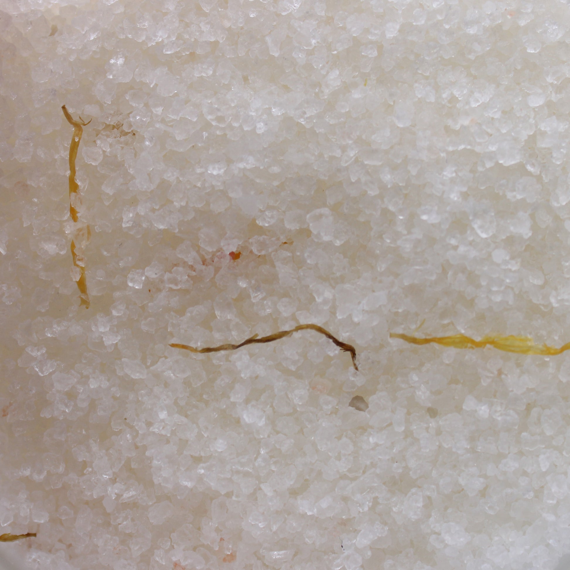 Himalayan Bath Salt Energise blend with lemon, ginger, orange oils, avocado oil, and calendula flowers in a 500g pouch.