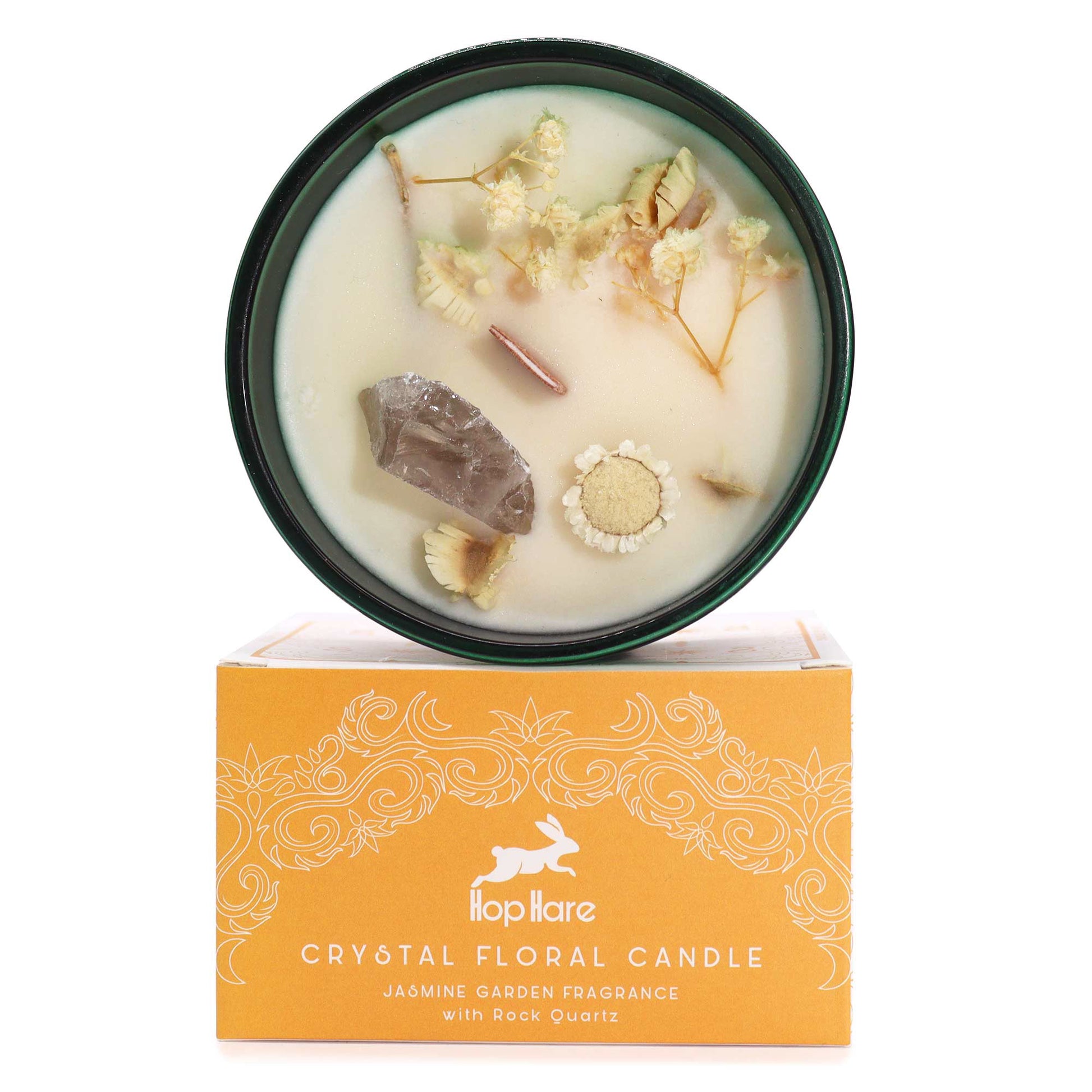 Hop Hare The Lion crystal candle with rock quartz, dried flowers, and tarot card in dark green jar
