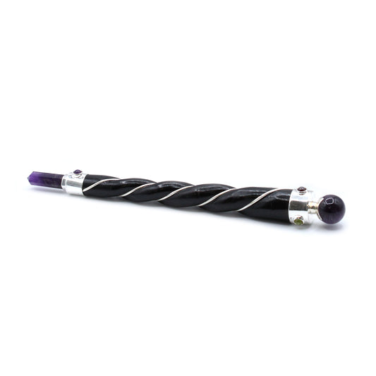 Twisted wooden wand with silver plated copper wire, amethyst point and sphere, and gemstones. Perfect for spiritual healing, intuition, and energy work.

