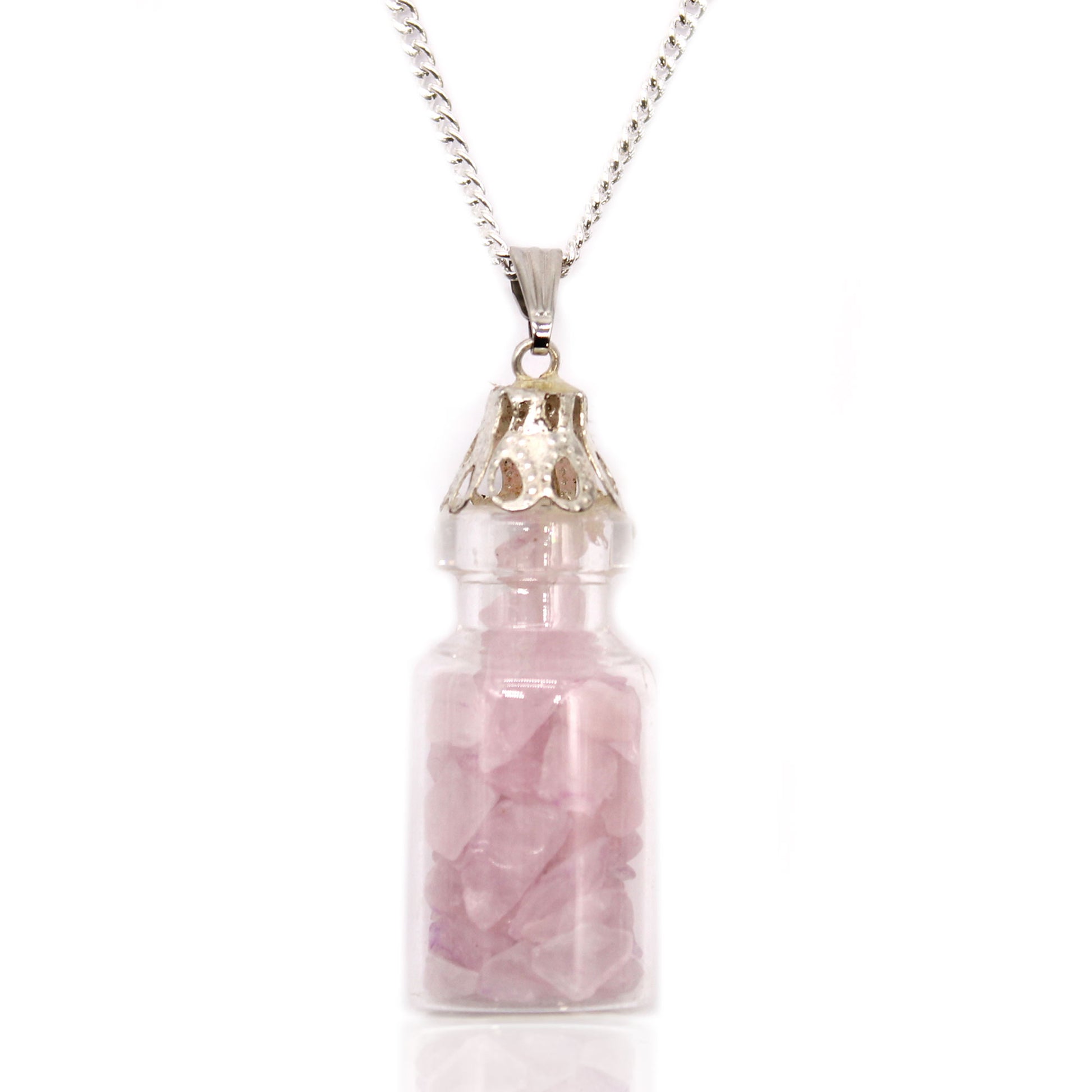 "Mini glass bottle necklace filled with rose quartz chips, on a silver-plated chain"