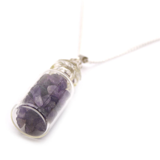 "Mini bottle necklace filled with purple amethyst chips, on a silver-plated chain"

