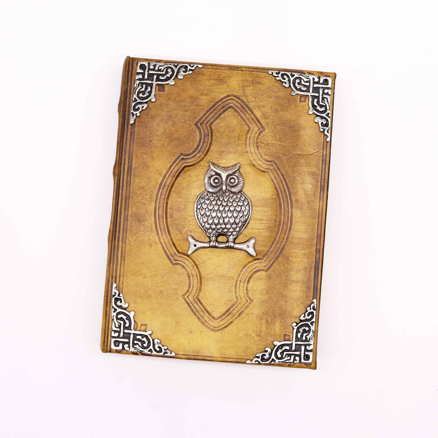 Leatherbound journal with embossed owl and zinc corners – cover view

