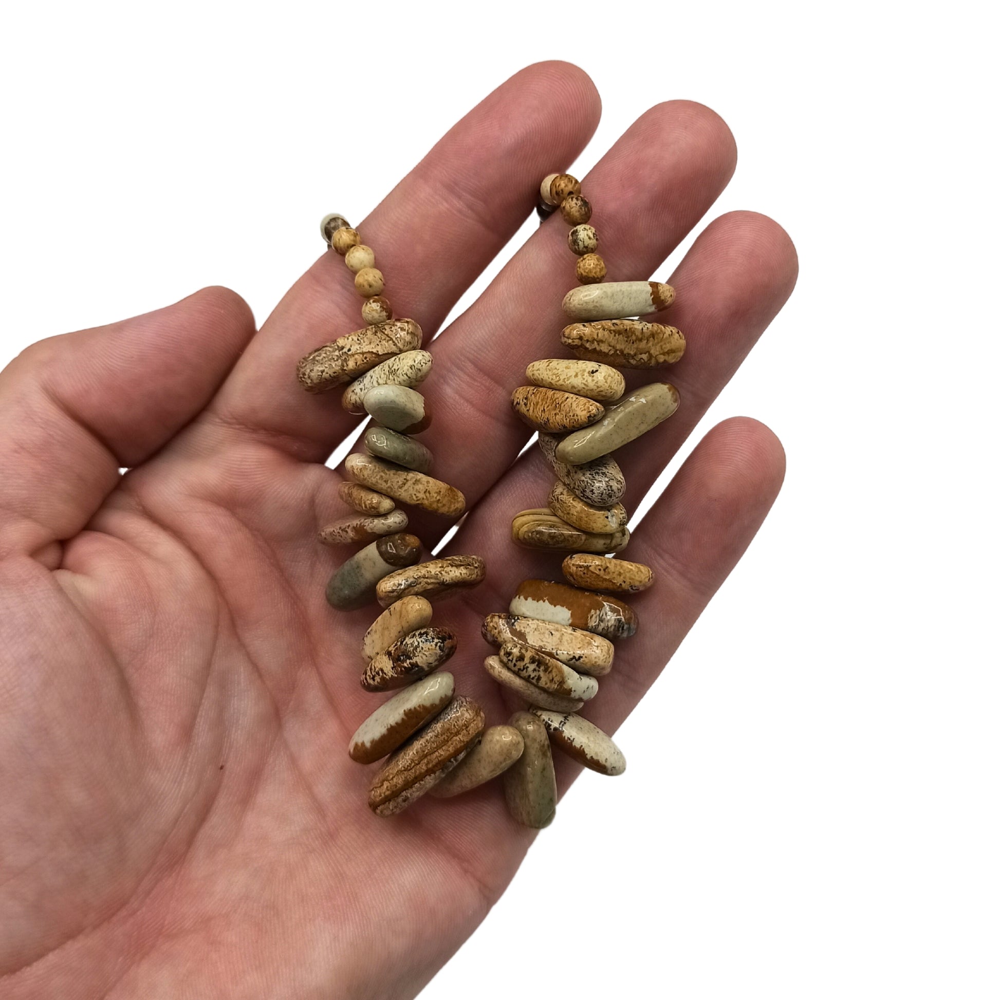"Longstone Gem Necklace with Map Stone gemstone chips and round beads featuring earthy brown and tan markings, displayed on hand."

