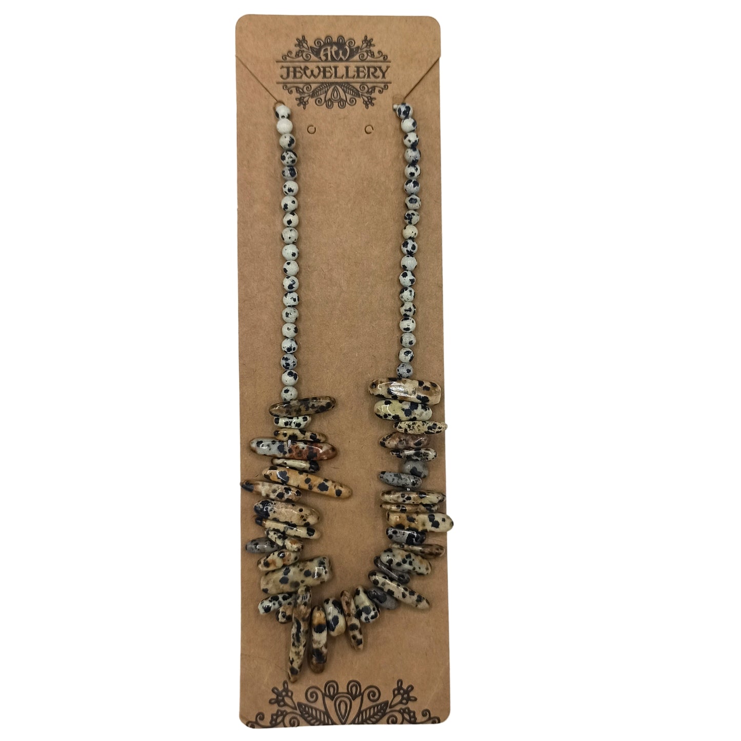 "Longstone Gem Necklace with Dalmatian Stone gemstone chips and round beads featuring natural black spots on a cream base, displayed on brown card."

