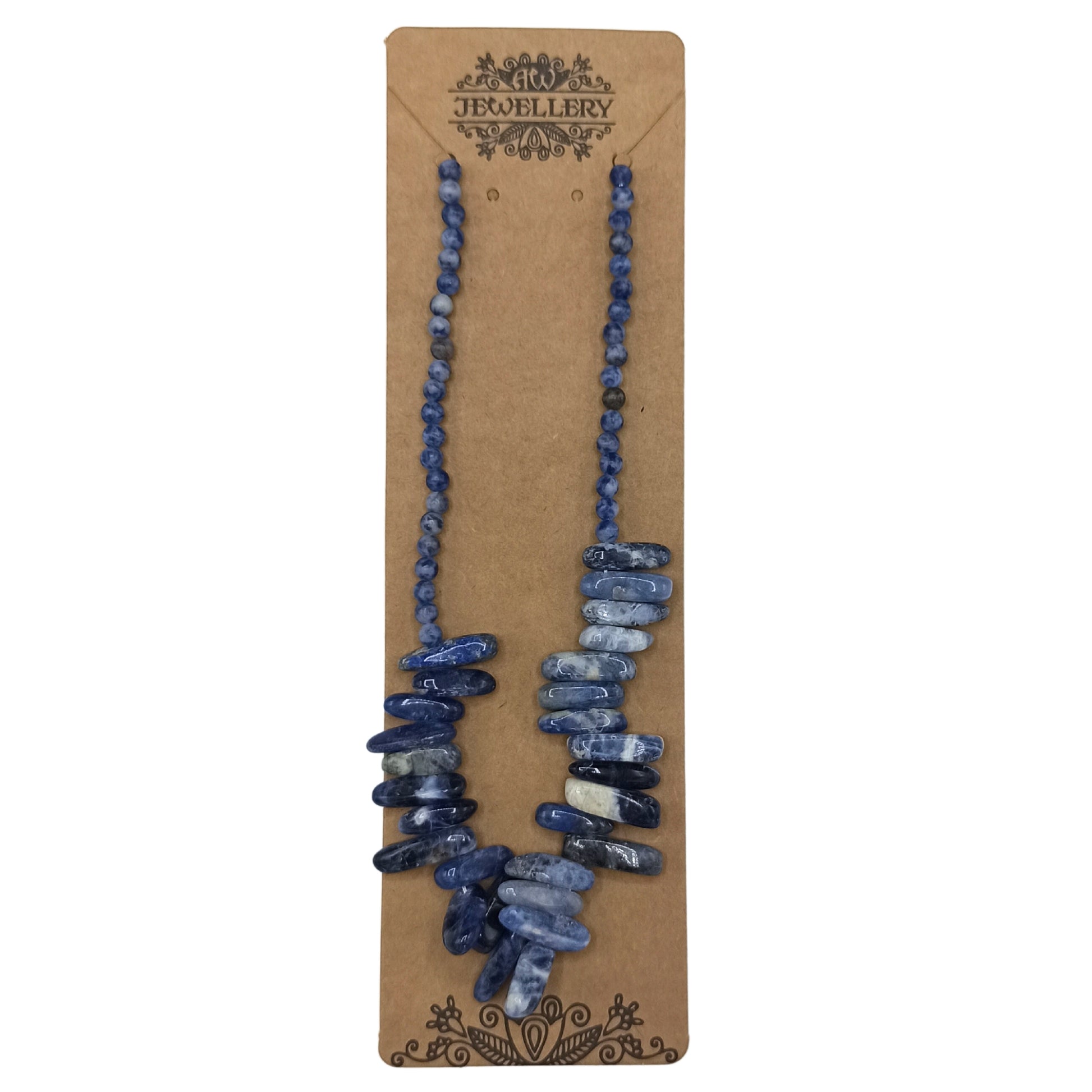 "Longstone Gem Necklace featuring deep blue sodalite gemstone chips and matching round beads, displayed on a brown card."

