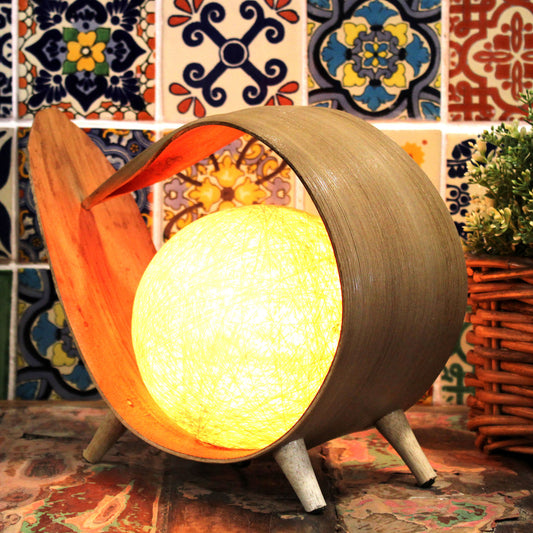 Natural coconut lamp with curved loop shape and cotton twine shade, handcrafted in Bali