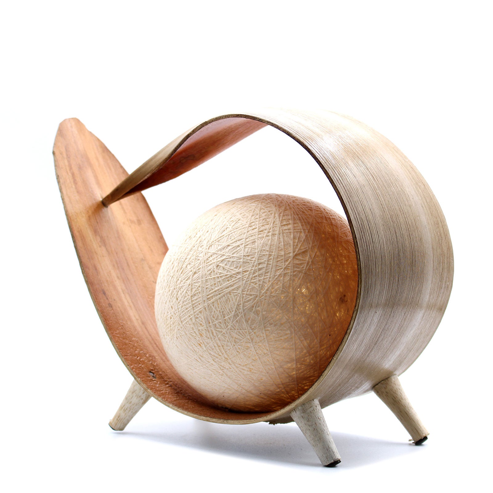 Natural coconut lamp with curved loop shape and cotton twine shade, handcrafted in Bali