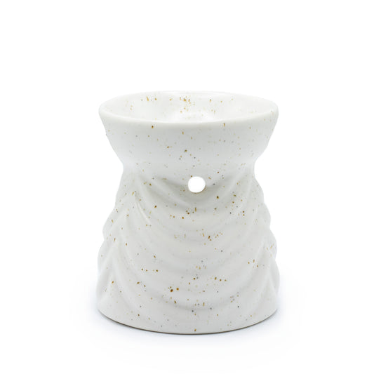 Ivory ceramic oil burner with geometric pattern and golden speckles, designed for essential oils and tealights

