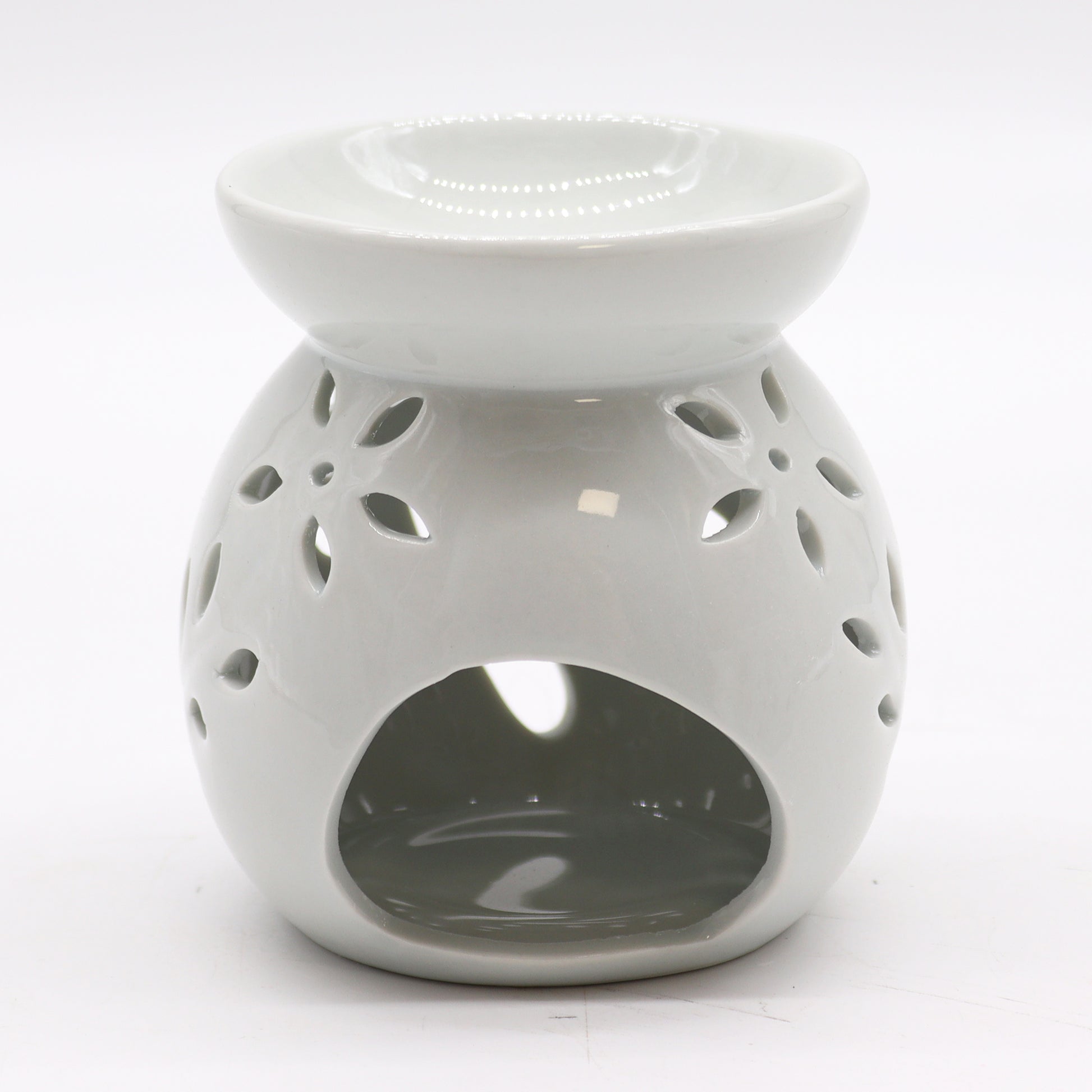 10cm white ceramic oil burner with Tree of Life cutout design and glossy finish

