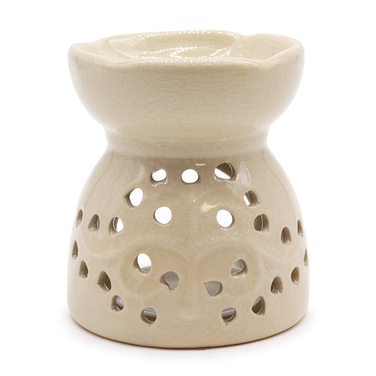Ivory ceramic oil burner with Tree of Life cutouts