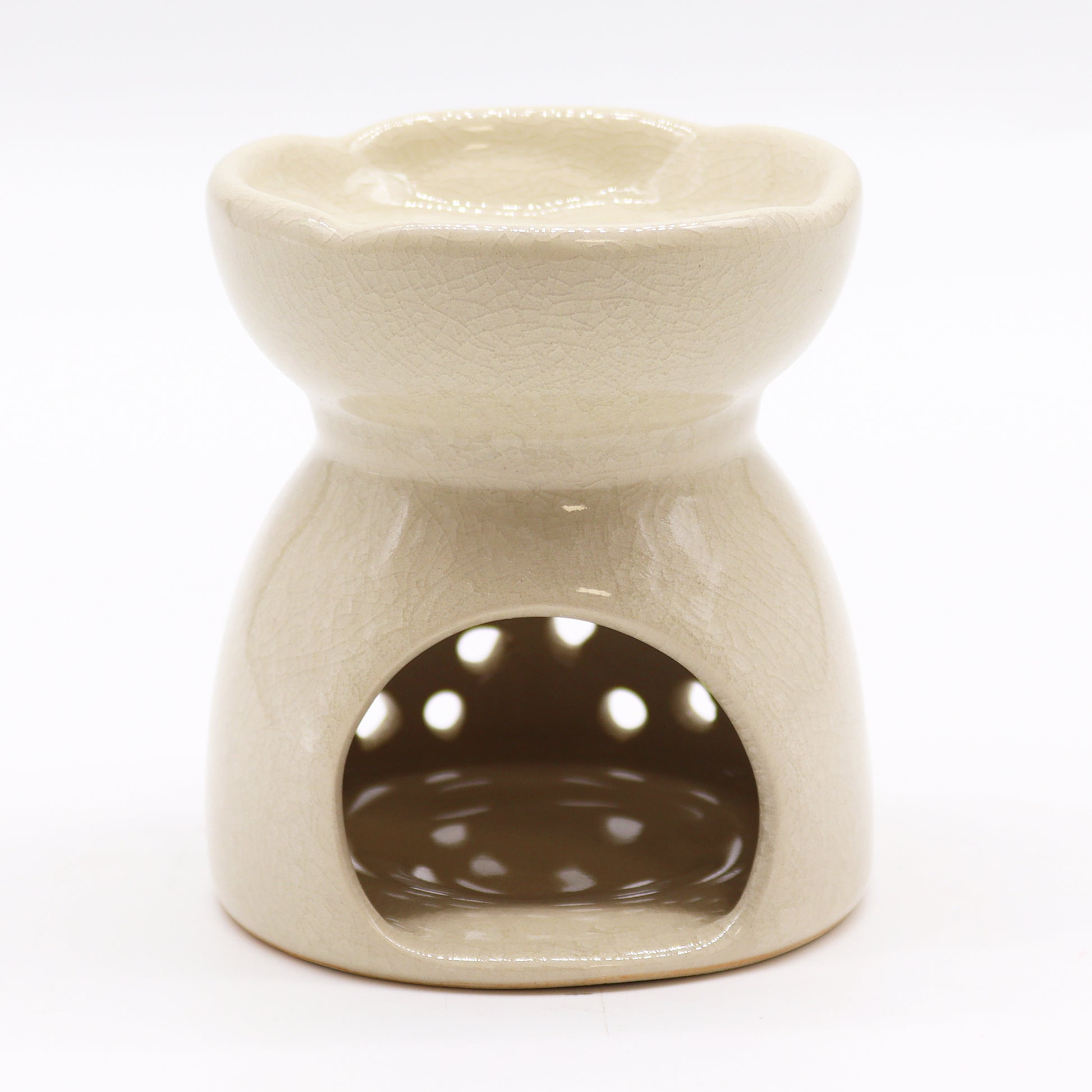 Ivory ceramic oil burner with Tree of Life cutouts