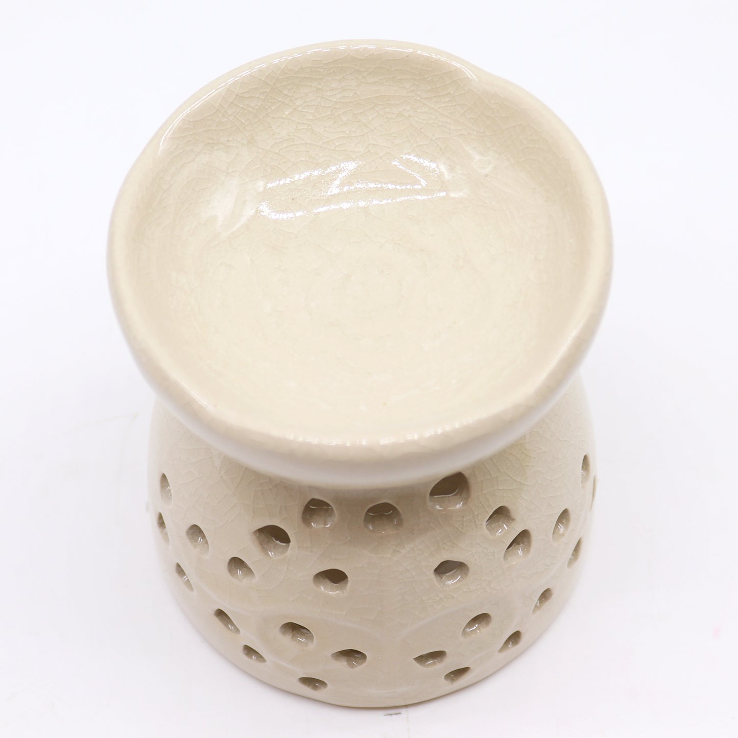 Ivory ceramic oil burner with Tree of Life cutouts