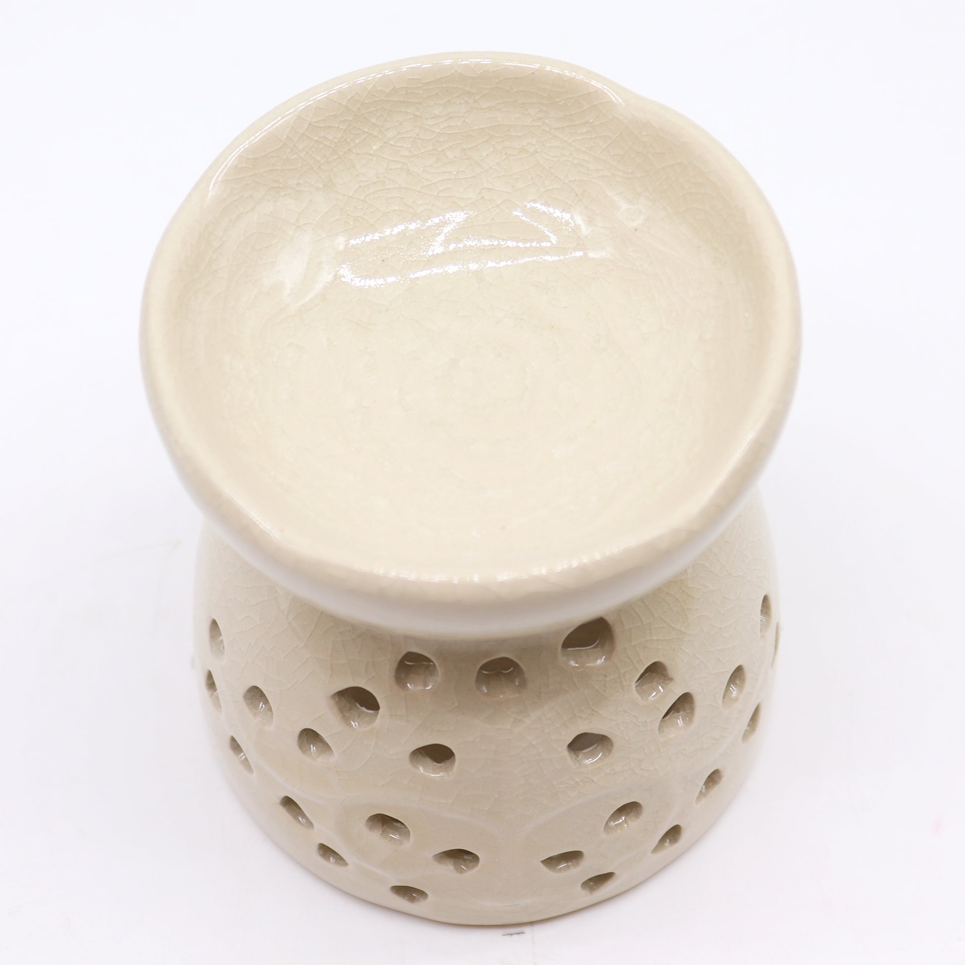 Ivory ceramic oil burner with Tree of Life cutouts