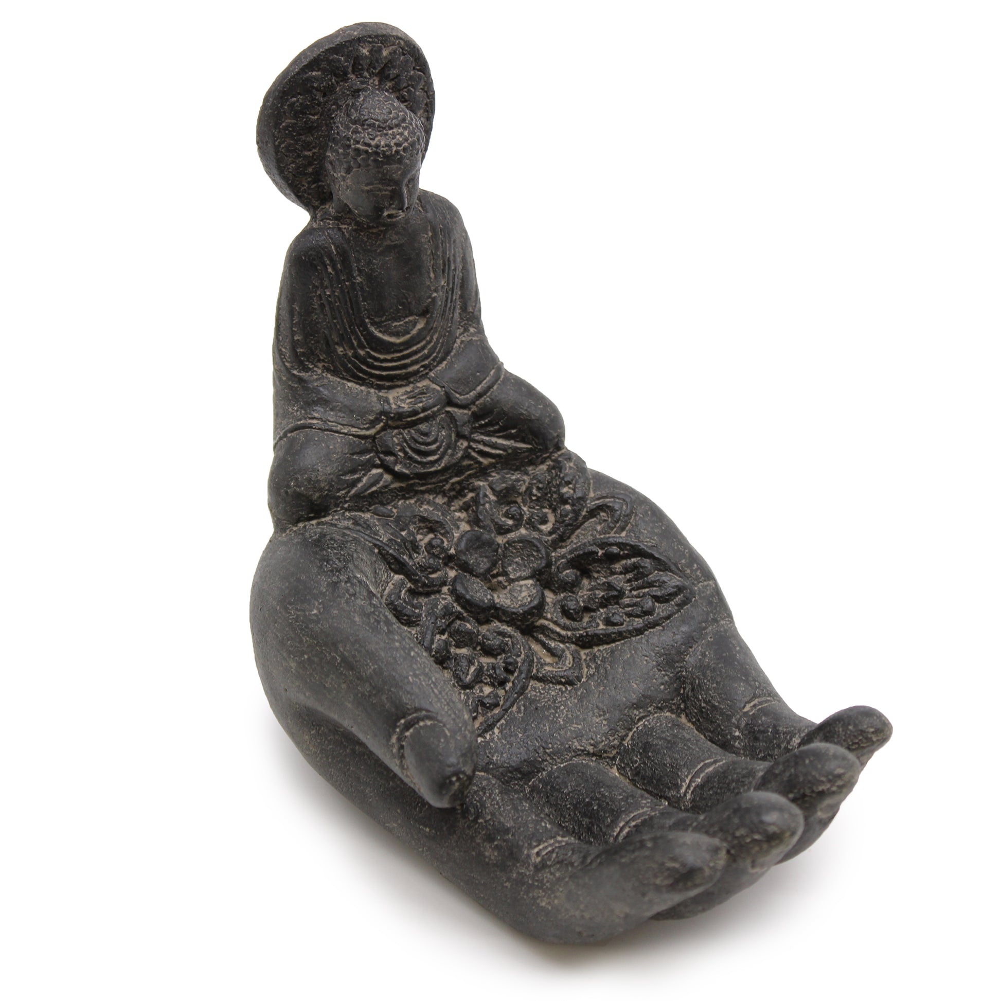 Black stone incense holder shaped like a hand with a Buddha figure, handcrafted in Indonesia