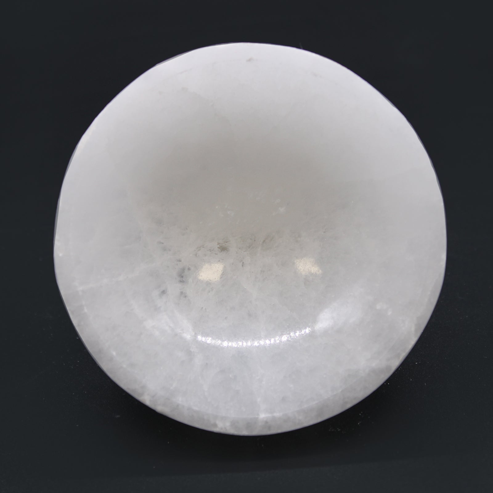 Selenite Round Bowl – 10cm, smooth hand-carved Moroccan bowl with moonlike glow

