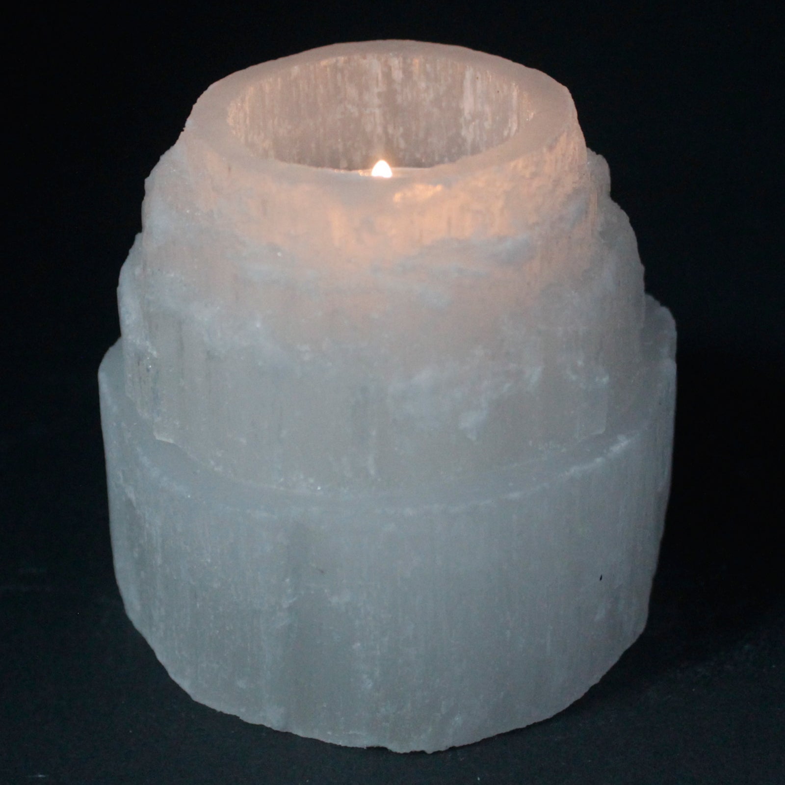 Selenite Mountain Top Candle Holder – 8cm round crystal tea light holder with glowing translucent sides