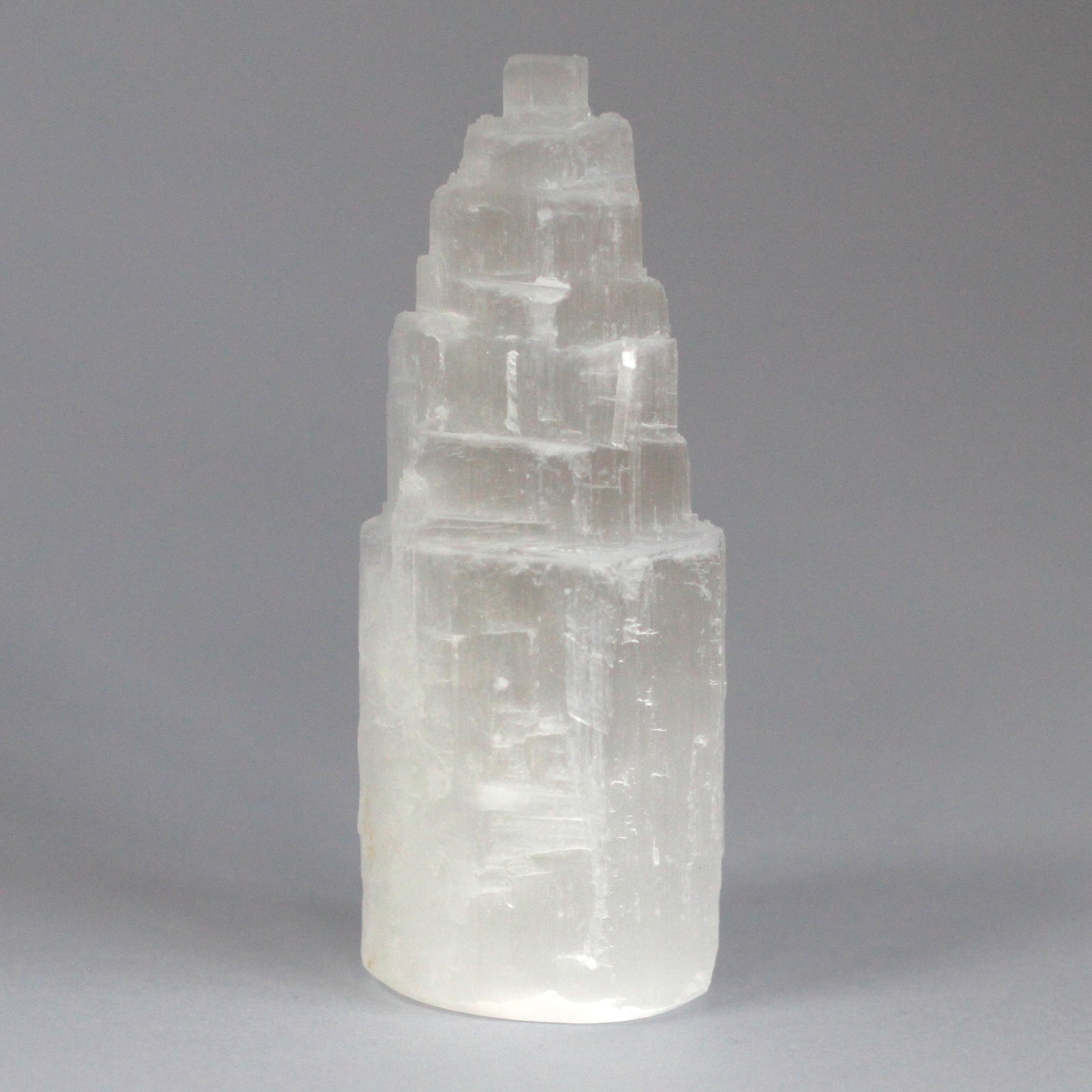 10cm Natural Selenite Tower with lunar glow, ethically sourced from Morocco

