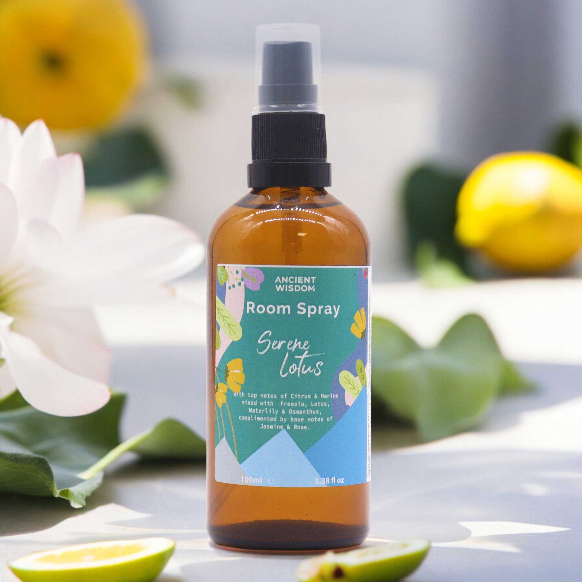 Amber bottle of Serene Lotus Summer Home Room Spray – 100ml calming citrus and floral blend

