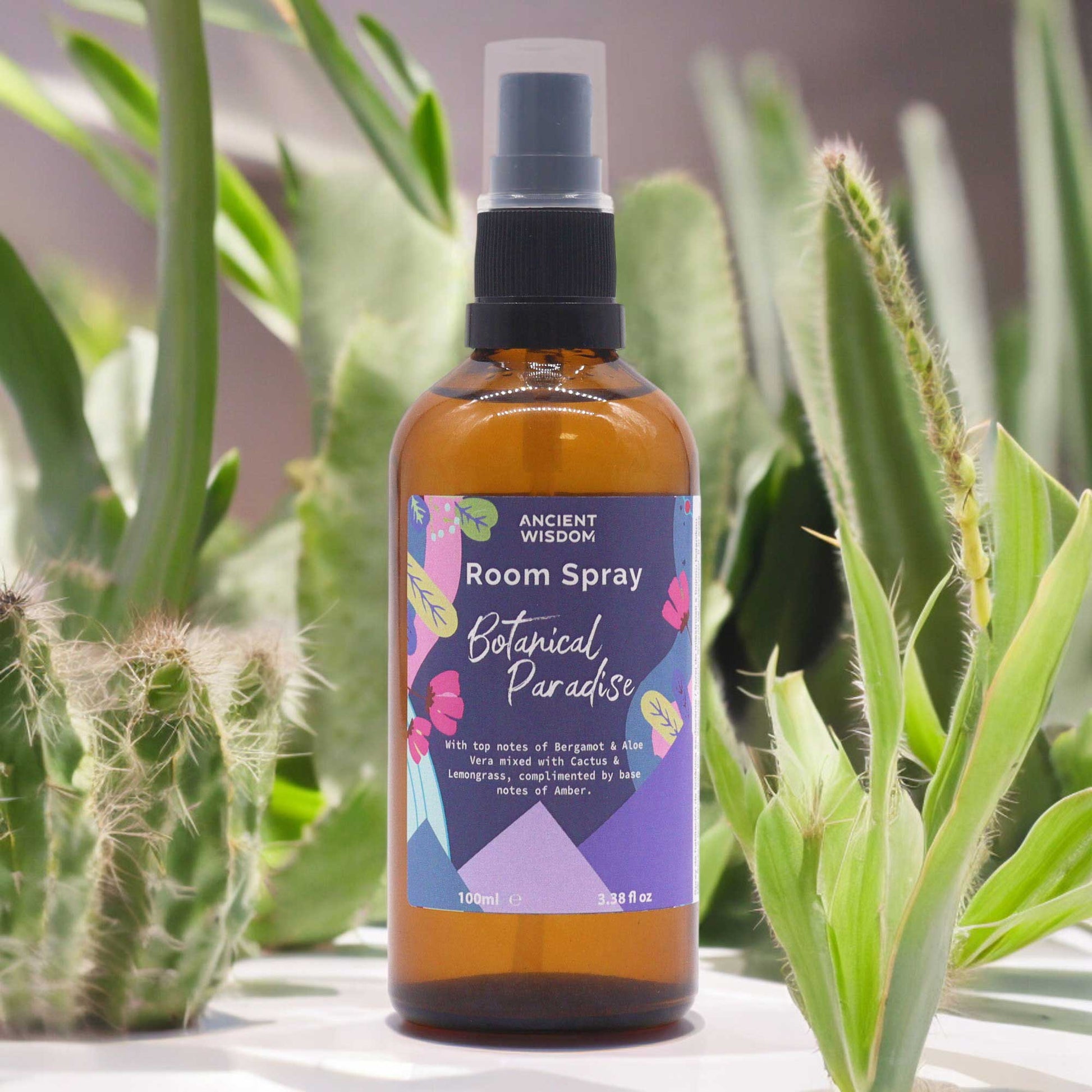 Amber bottle of Botanical Paradise Summer Home Room Spray – 100ml exotic citrus and green botanical blend

