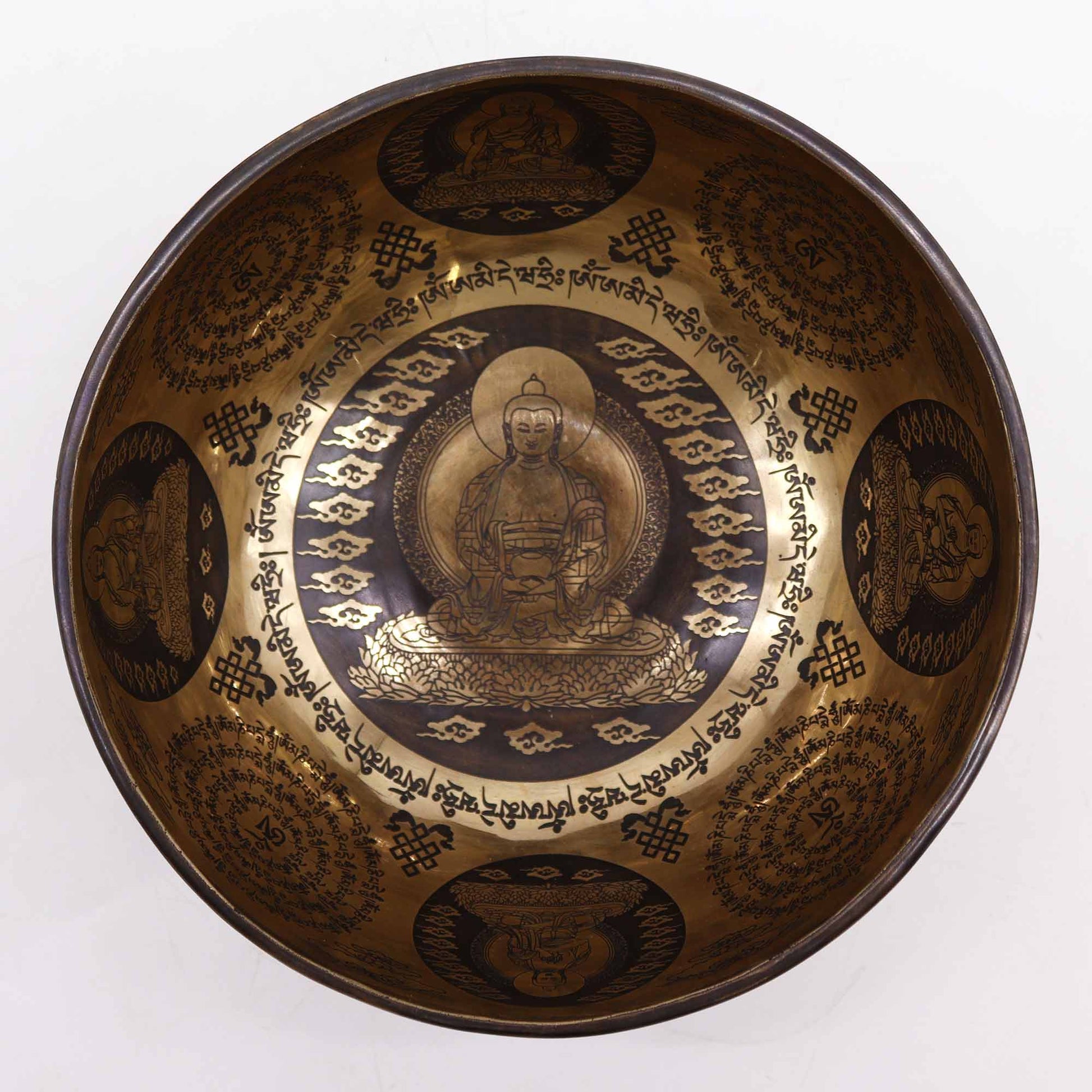 Tibetan singing bowl with engraved Five Buddhas and sacred symbols – 21cm, handcrafted for meditation and healing.

