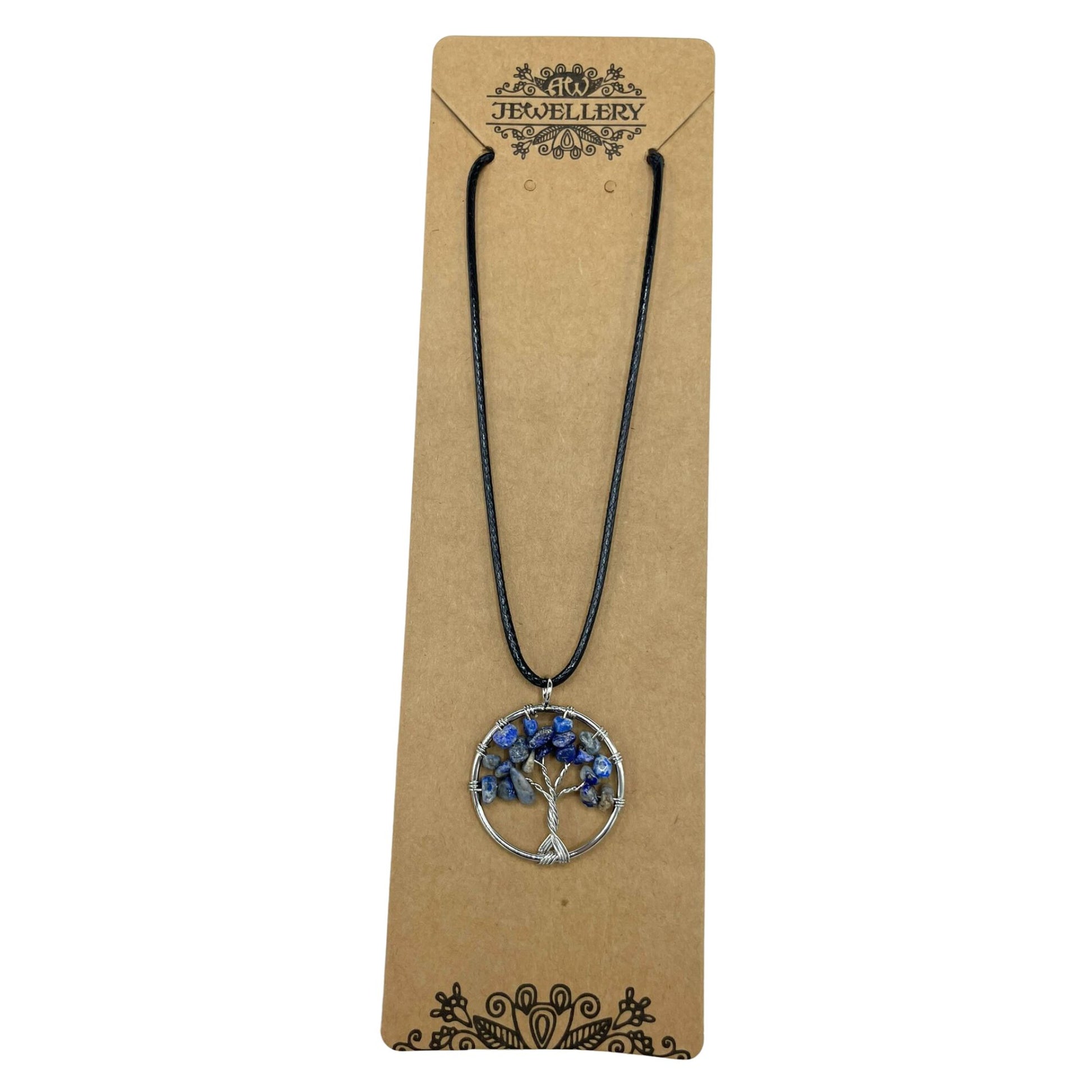 "Tree of Life Pendant with sodalite gemstone, handcrafted wire-wrapped branches on a black cord necklace."

