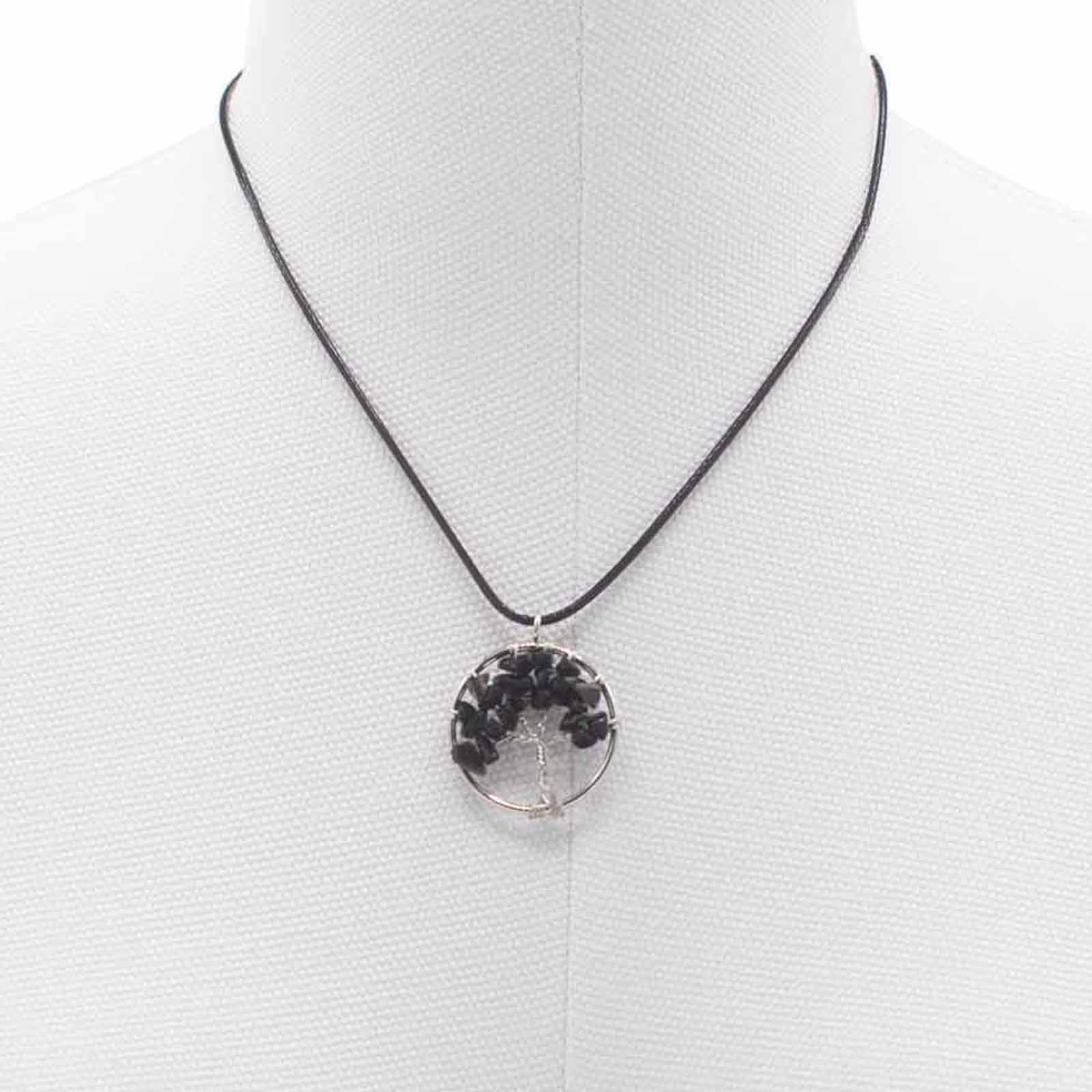 "Tree of Life pendant with black agate gemstone, silver wire-wrapped branches on a black cord necklace."

