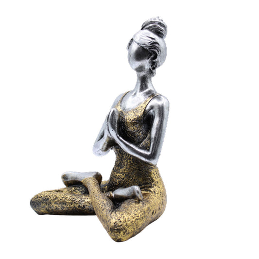 Hand-painted Yoga Lady statue in silver and gold, seated in lotus pose with namaste hands